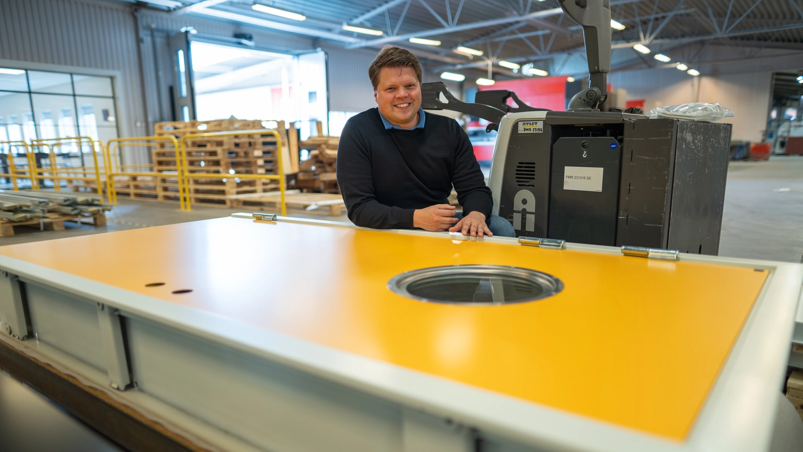 Sebastian Hellberg, CEO of Hellbergs Doors in Mellerud, describes himself as a “door and gate nerd.” Here he’s pictured next to a steel door with an extra-deep frame.