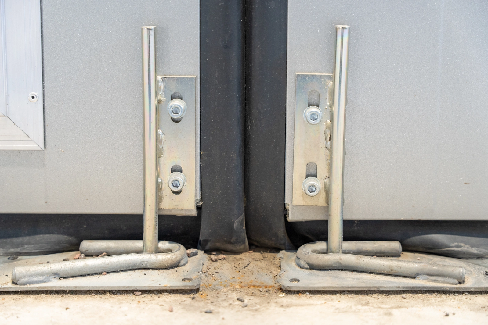 Close up of security bolts welded to the door frame