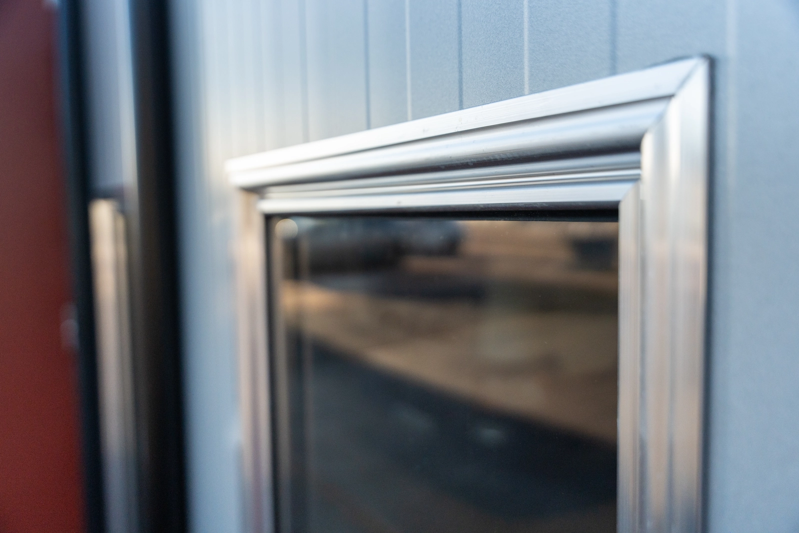 Close up of window frame on a Torverk Q-Door FX, folding door